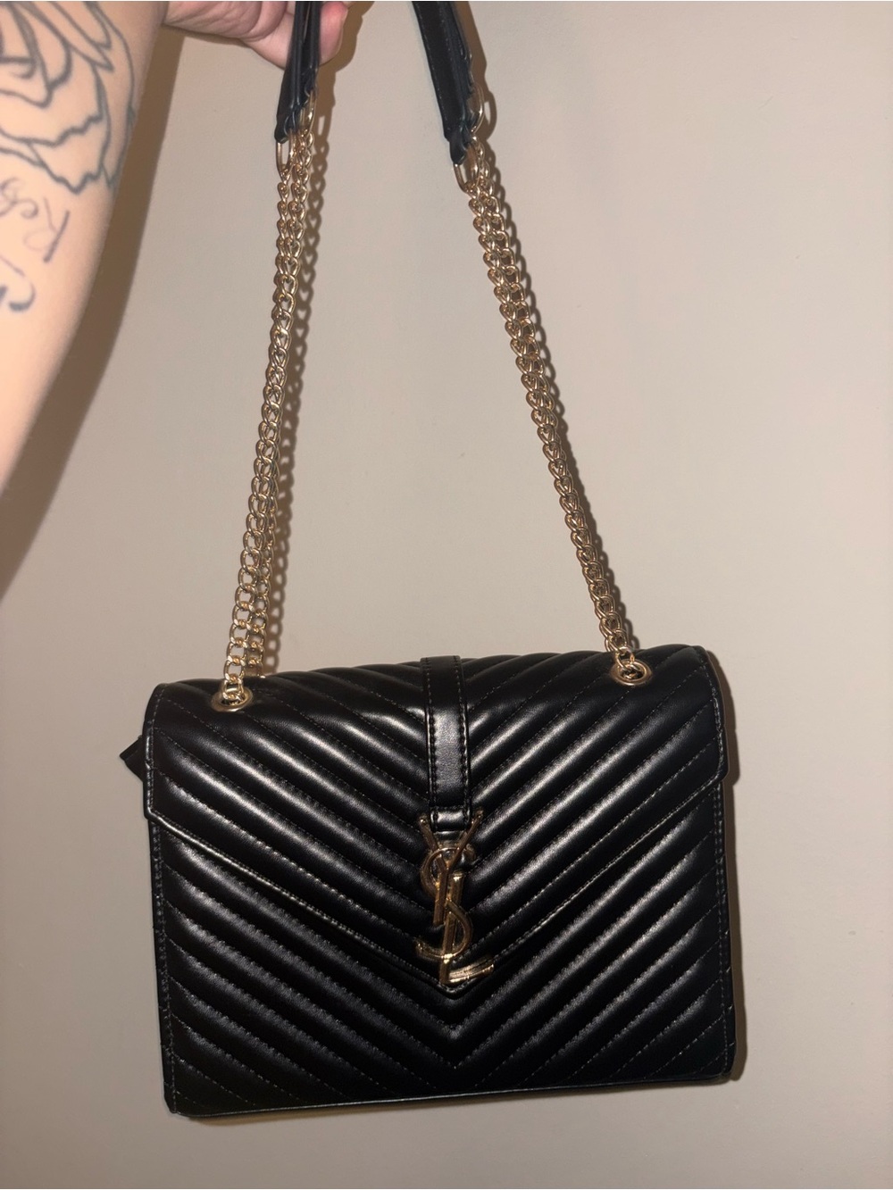 Black Quilted Shoulder Bag with Gold Chain and Logo Hardware
